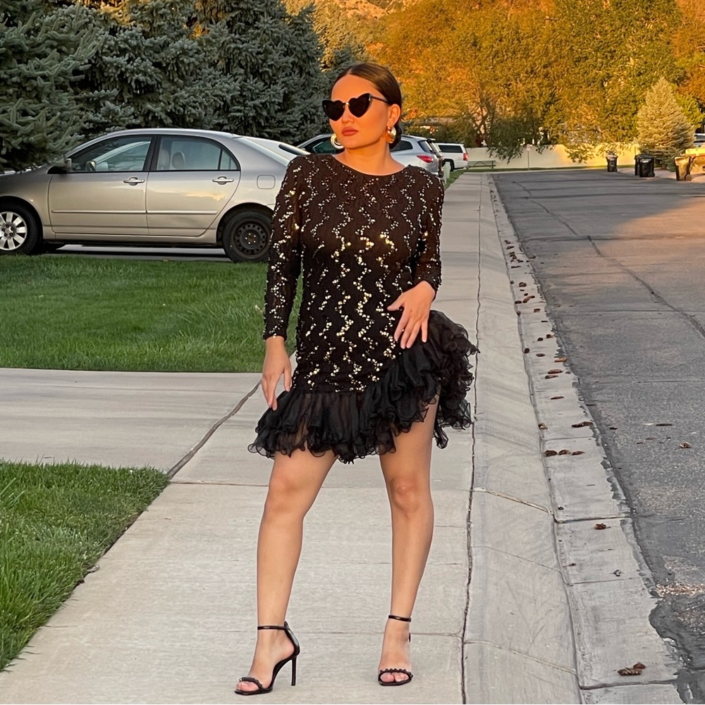 Stand out in this 80s Dave and Johnny asymmetrical sequin dress—vintage glam!